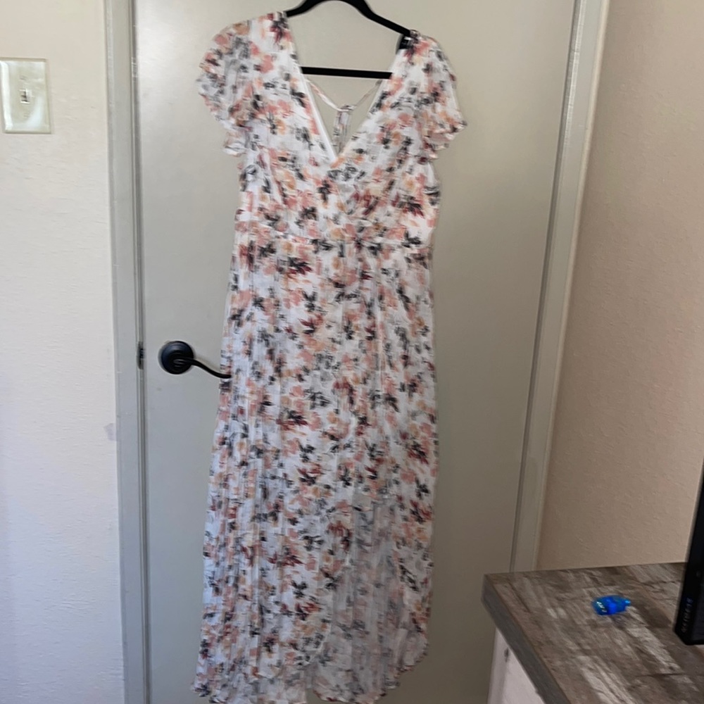 New with tags! Beautiful floral torrid dress with shorts underneath.